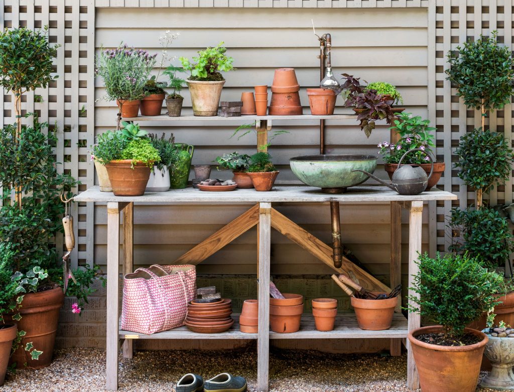 Terracotta pots on a garden station