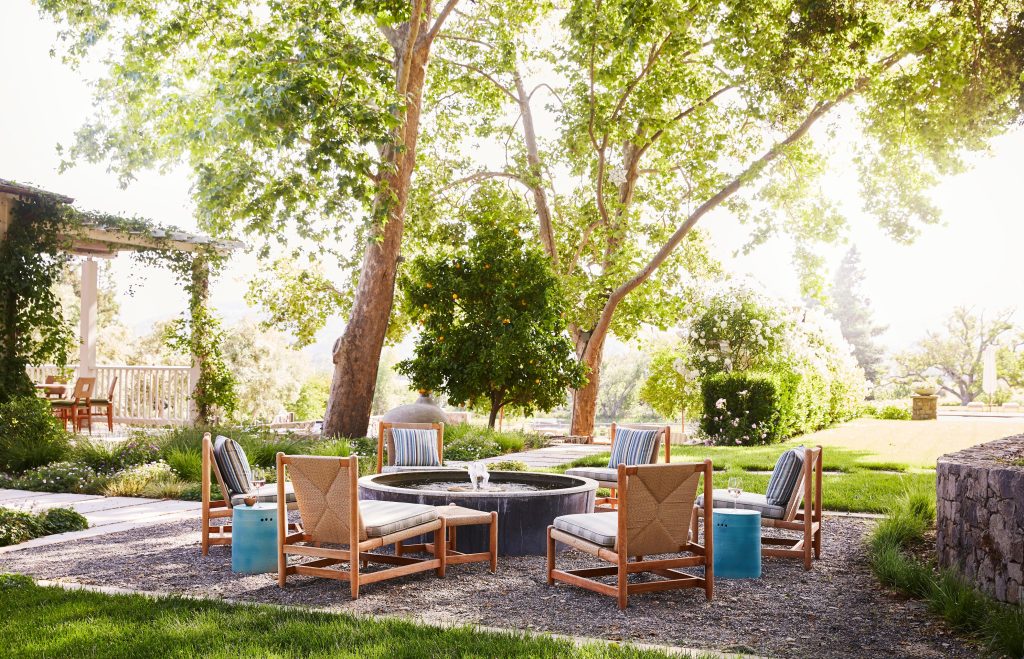 Outdoor seating area with circular water feature
