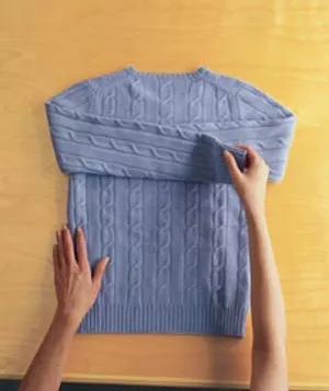 How to Folder a Sweater Step 1