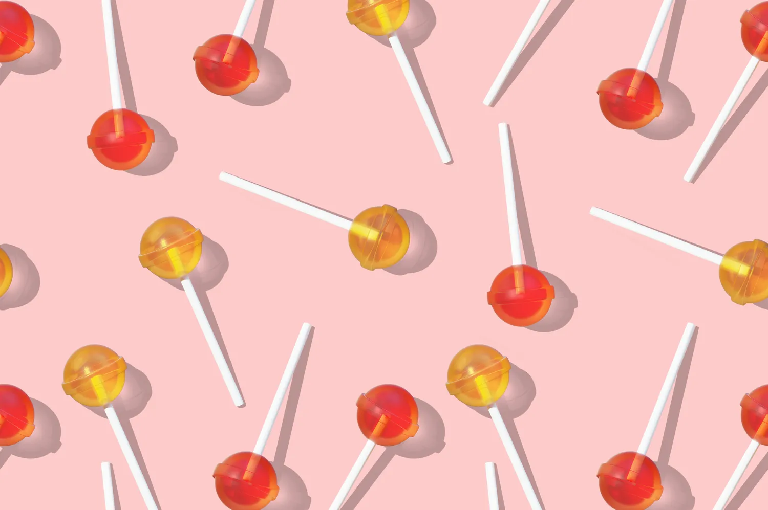 Lollipops on pink background