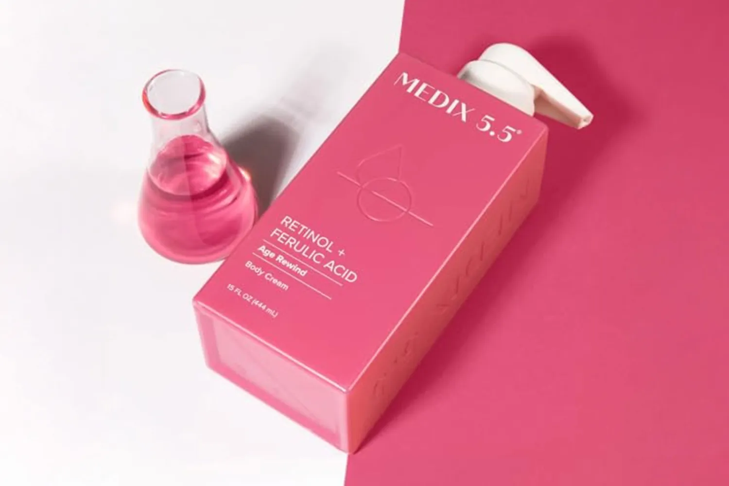 Medix 55 Retinol Ferulic Acid AntiAging Skincare product with a beaker