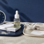 Displaying skincare supplies in tabletop skincare arrangement for daily skincare routine for glowing skin