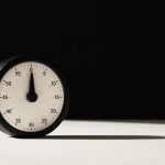 Timer standing upright in minimal studio tabletop for heal skin fast