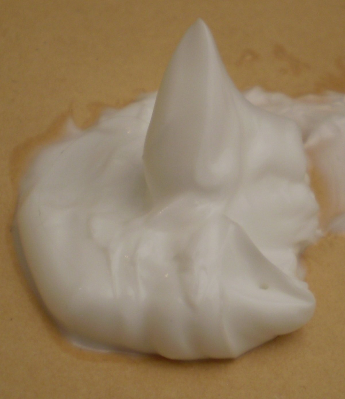 Dollop of thick white cream or moisturiser